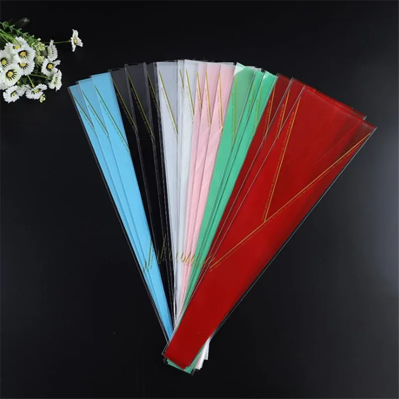 20pcs/lot Valentine Day Rose Bouquet Gifts Bags Golden Triangle Clear Plastic Bags Flower Packaging Cone Shape Bouquet Bag
20pcs/lot Valentine Day Rose Bouquet Gifts Bags Golden Triangle Clear Plastic Bags Flower Packaging Cone Shape Bouquet Bag