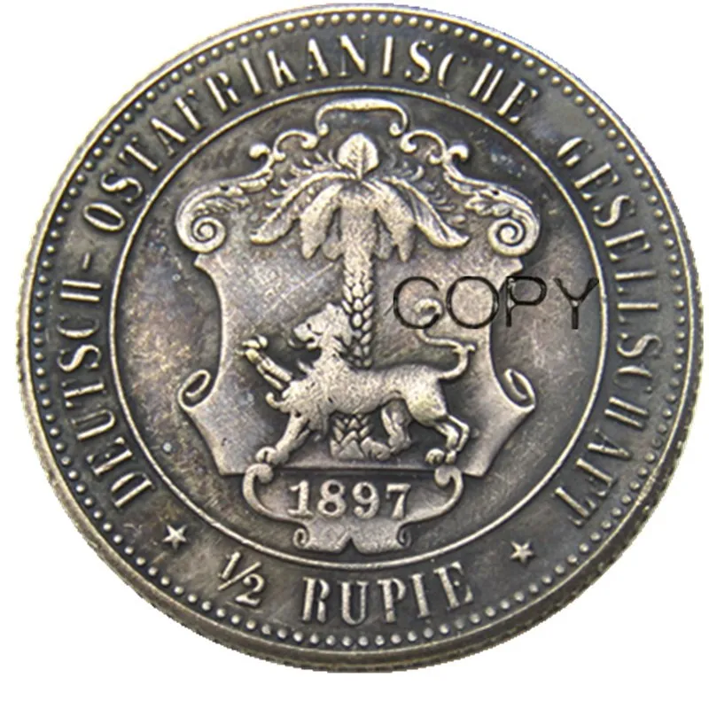 1897 г., Германия, Восточная Африка, 1/2, император Rupie Coin Guilelmus II, Посеребренная копировальная монета
1897 г., Германия, Восточная Африка, 1/2, император Rupie Coin Guilelmus II, Посеребренная копировальная монета