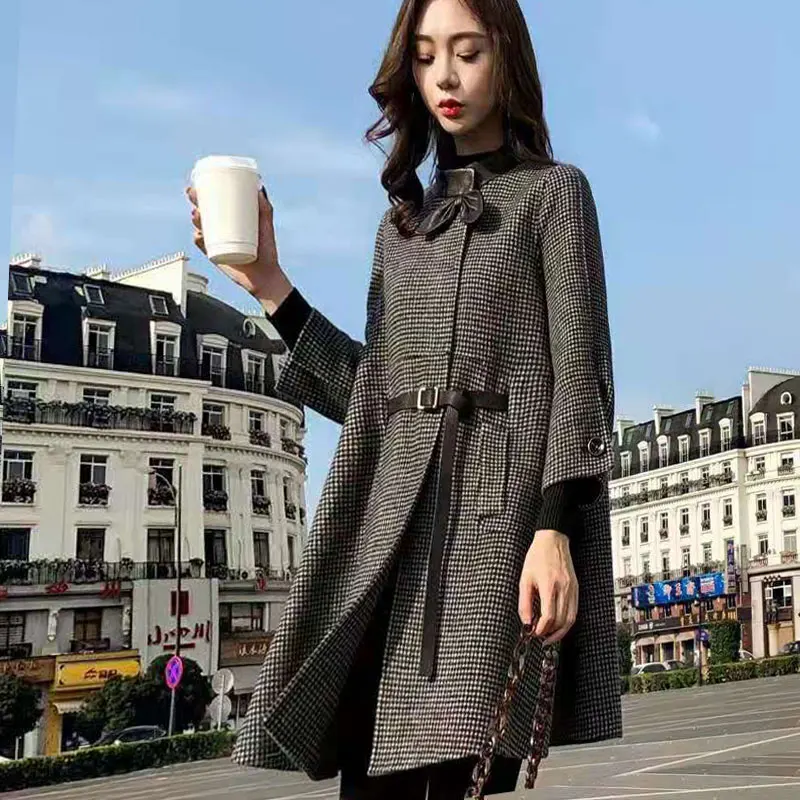 Women's early autumn woolen coat in the long paragraph large size Korean version of the cloak coat tartan coat women
Women's early autumn woolen coat in the long paragraph large size Korean version of the cloak coat tartan coat women