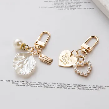 The Lovely Fairy Has a Keychain Letter Heart Shell Airpods Protective Case Keyrings Metal Car Key Chain
The Lovely Fairy Has a Keychain Letter Heart Shell Airpods Protective Case Keyrings Metal Car Key Chain