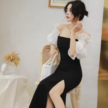 2020 Korean Elegant Ruffles Slash Neck Sheath Slim Long Party Dress Women Sexy Off Shoulder Puff Sleeve Maxi Dress 
2020 Korean Elegant Ruffles Slash Neck Sheath Slim Long Party Dress Women Sexy Off Shoulder Puff Sleeve Maxi Dress