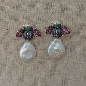 White Coin Pearl White Golden Plated Battle CZ Earrings
White Coin Pearl White Golden Plated Battle CZ Earrings