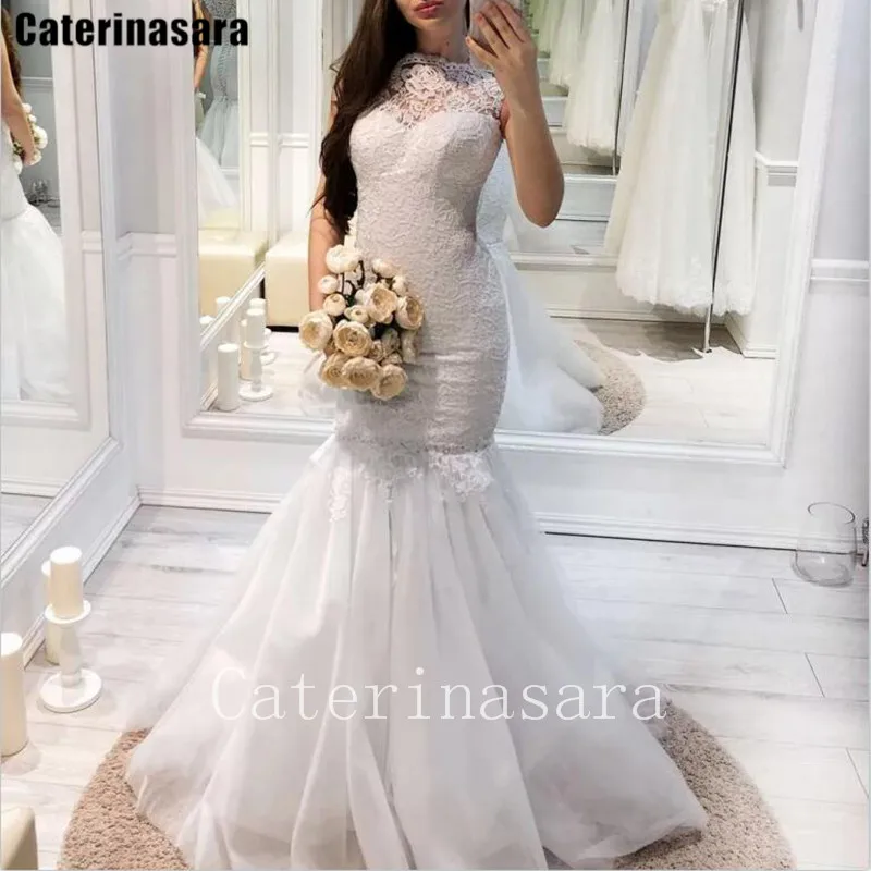 Белое кружевное свадебное платье с круглым вырезом на молнии без рукавов с юбкой-годе из органзы свадебное платье со шлейфом CT032
Белое кружевное свадебное платье с круглым вырезом на молнии без рукавов с юбкой-годе из органзы свадебное платье со шлейфом CT032