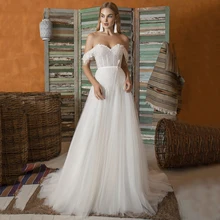 Bohemian Off Shoulder Wedding Dress Tulle Sweetheart Neck Bridal Gown Zipper Back Sleeveless Simple Свадебное платье 2021
Bohemian Off Shoulder Wedding Dress Tulle Sweetheart Neck Bridal Gown Zipper Back Sleeveless Simple Свадебное платье 2021