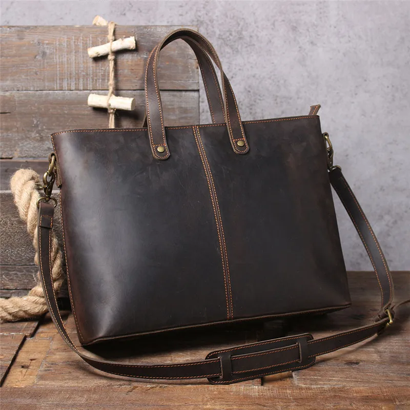 Simple retro men's genuine leather portable briefcase first layer cowhide large-capacity one-shoulder messenger computer bag
Simple retro men's genuine leather portable briefcase first layer cowhide large-capacity one-shoulder messenger computer bag