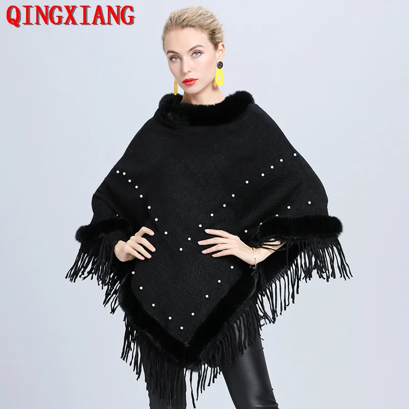 2020 Beading Pearls Black Pullover Faux Fur O Neck Jacquard Weave Capes Triangle Tassel Poncho Autumn Thick Warm Sweater
2020 Beading Pearls Black Pullover Faux Fur O Neck Jacquard Weave Capes Triangle Tassel Poncho Autumn Thick Warm Sweater