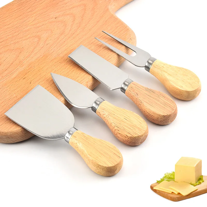 4Pcs/Set Oak Handle Sets Cheese Knives Stainless Steel Pizza Bread Cream Baking Slicer Butter Fork Cutter Useful Kitchen Tools 
4Pcs/Set Oak Handle Sets Cheese Knives Stainless Steel Pizza Bread Cream Baking Slicer Butter Fork Cutter Useful Kitchen Tools