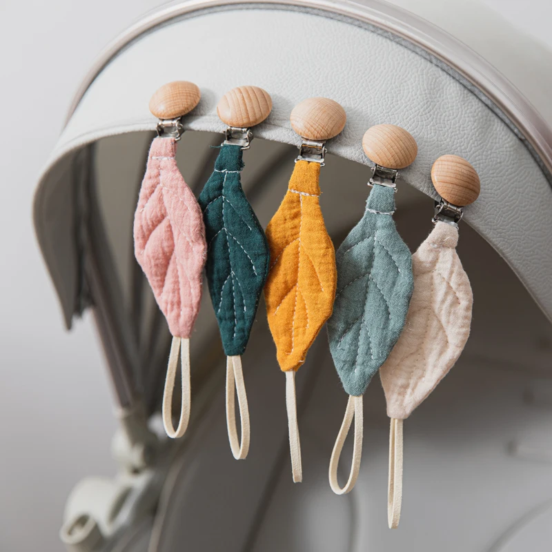 1pc Cotton Baby Pacifier Clip Chain Beech Wood Pacifier Clip Cartoon Leaves Solid Color Soother Holder Infant Teething Chain
1pc Cotton Baby Pacifier Clip Chain Beech Wood Pacifier Clip Cartoon Leaves Solid Color Soother Holder Infant Teething Chain