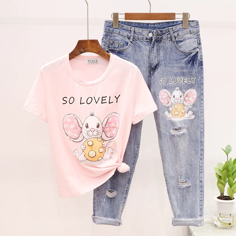 Summer Women Two Piece Outfits Beading Cartoon Print T-shirt + Hole Denim Pants Set Korean Fashion Loose Jeans + Tee Femme 2pc
Summer Women Two Piece Outfits Beading Cartoon Print T-shirt + Hole Denim Pants Set Korean Fashion Loose Jeans + Tee Femme 2pc