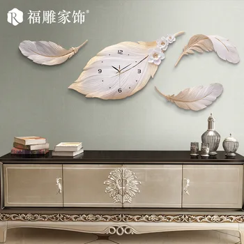Nordic living room wall clock creative light luxury feather warm decoration watch household fashion modern simple clock 
Nordic living room wall clock creative light luxury feather warm decoration watch household fashion modern simple clock