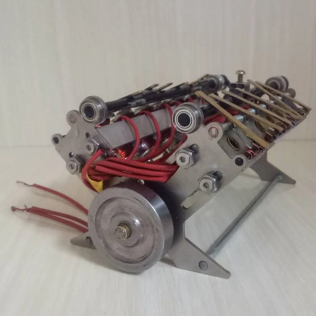 V12 Solenoid Engine High Speed Electromagnetic Engine Educational Experiment Model For Model Car Ship For Experiments Teaching
V12 Solenoid Engine High Speed Electromagnetic Engine Educational Experiment Model For Model Car Ship For Experiments Teaching