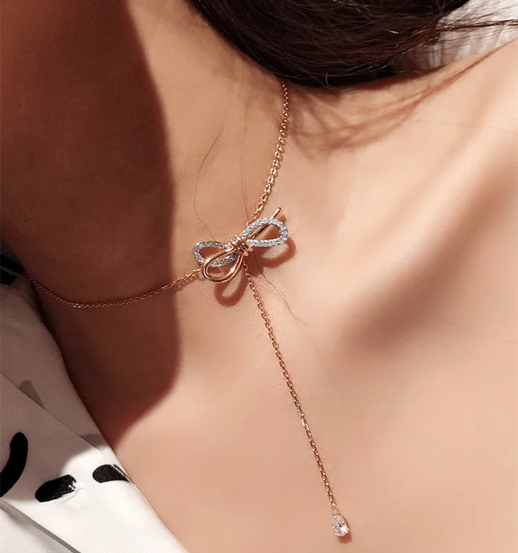 S925 sterling silver new bow tassel necklace women's two-color short clavicle chain tide temperament net red crystal neck chain
S925 sterling silver new bow tassel necklace women's two-color short clavicle chain tide temperament net red crystal neck chain