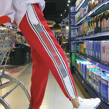 Women Harajuku Letter Print Hip Hop Harem Trousers High Waist Pencil Pants Fashion Streetwear Loose Trousers 
Women Harajuku Letter Print Hip Hop Harem Trousers High Waist Pencil Pants Fashion Streetwear Loose Trousers