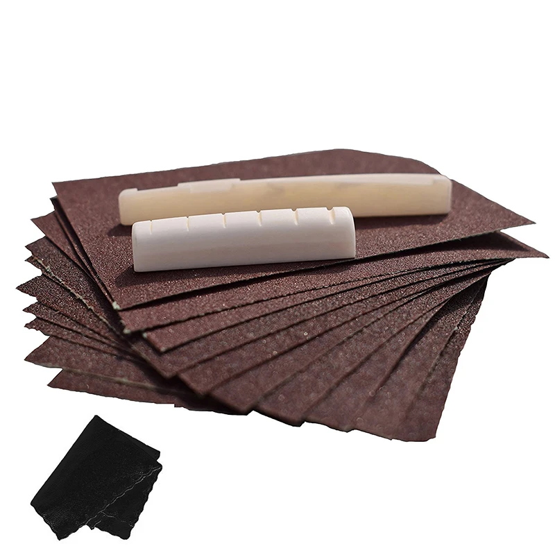 Acoustic Guitar Bone Bridge Saddle and Nut Kit With Guitar Accessories Parts Sand Paper and Clean Cloth
Acoustic Guitar Bone Bridge Saddle and Nut Kit With Guitar Accessories Parts Sand Paper and Clean Cloth