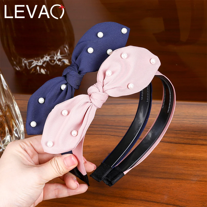 LEVAO Cute Pearl Bowknot Hairband Women Solid Color Hair Bow Hair Hoop Headband Rabbit Bezel Hairbands Girls Hair Accessories 
LEVAO Cute Pearl Bowknot Hairband Women Solid Color Hair Bow Hair Hoop Headband Rabbit Bezel Hairbands Girls Hair Accessories