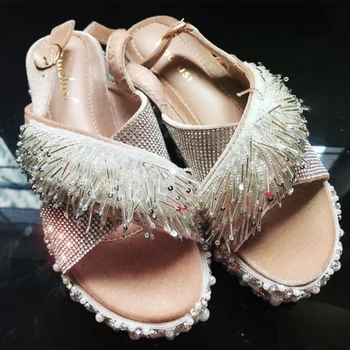 European and American handmade pearl beaded parquet ladies sandals tassel rhinestone high-heeled wedge heels fashion students
European and American handmade pearl beaded parquet ladies sandals tassel rhinestone high-heeled wedge heels fashion students