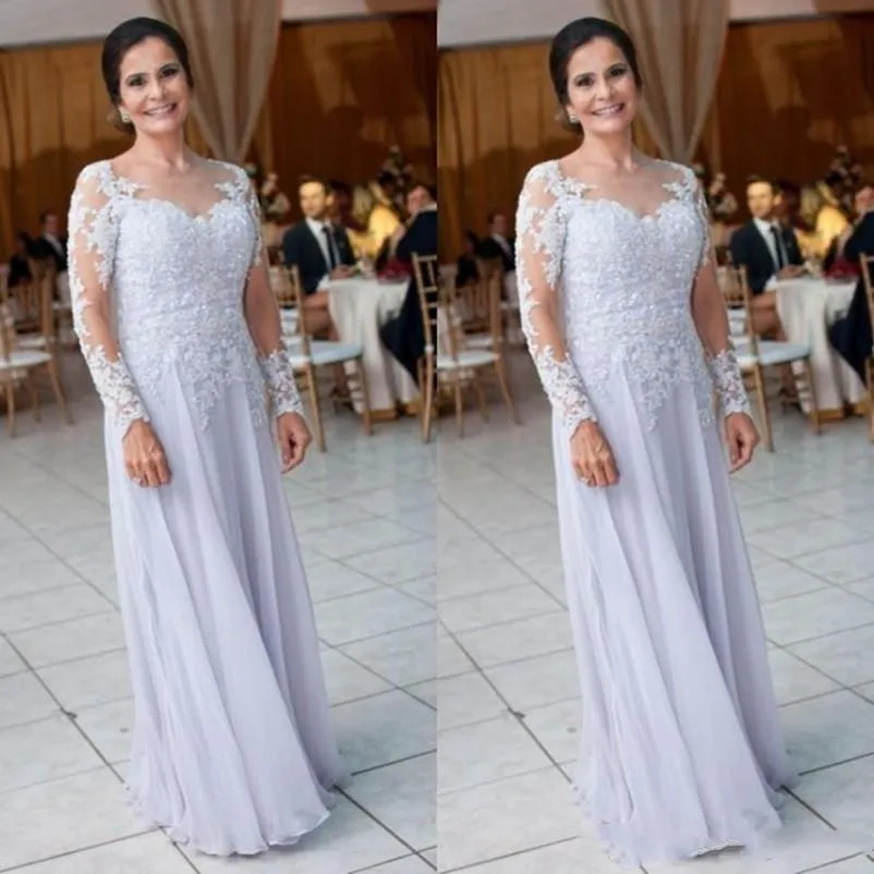 Fashion mother of the bride dresses 2019 sheer neck lace appliques long sleeves evening gowns floor length chiffon prom dress 
Fashion mother of the bride dresses 2019 sheer neck lace appliques long sleeves evening gowns floor length chiffon prom dress