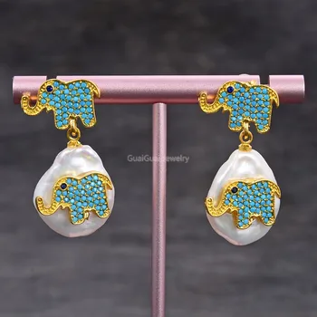 GG Jewelry Cultured White Coin Pearl Cz Elephant pave Earrings
GG Jewelry Cultured White Coin Pearl Cz Elephant pave Earrings