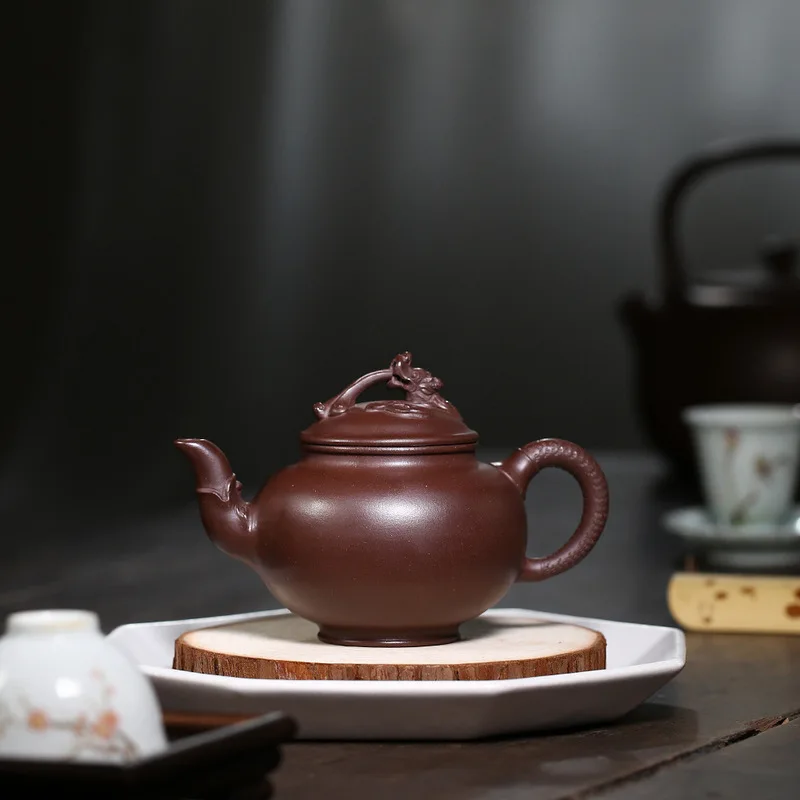 Yixing purple clay pot master pure manual inner wall seal raw ore Purple mud dragon rhyme pot 280cc spring pot promotion
Yixing purple clay pot master pure manual inner wall seal raw ore Purple mud dragon rhyme pot 280cc spring pot promotion