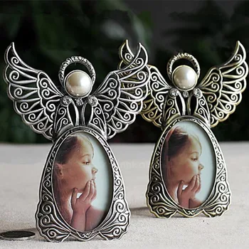 1 pcs Metal Vintage Mini Picture Frames Lovely Angel Style Classic Picture Photo Frame for Home Decor Kid Birthday Creative Gift 
1 pcs Metal Vintage Mini Picture Frames Lovely Angel Style Classic Picture Photo Frame for Home Decor Kid Birthday Creative Gift