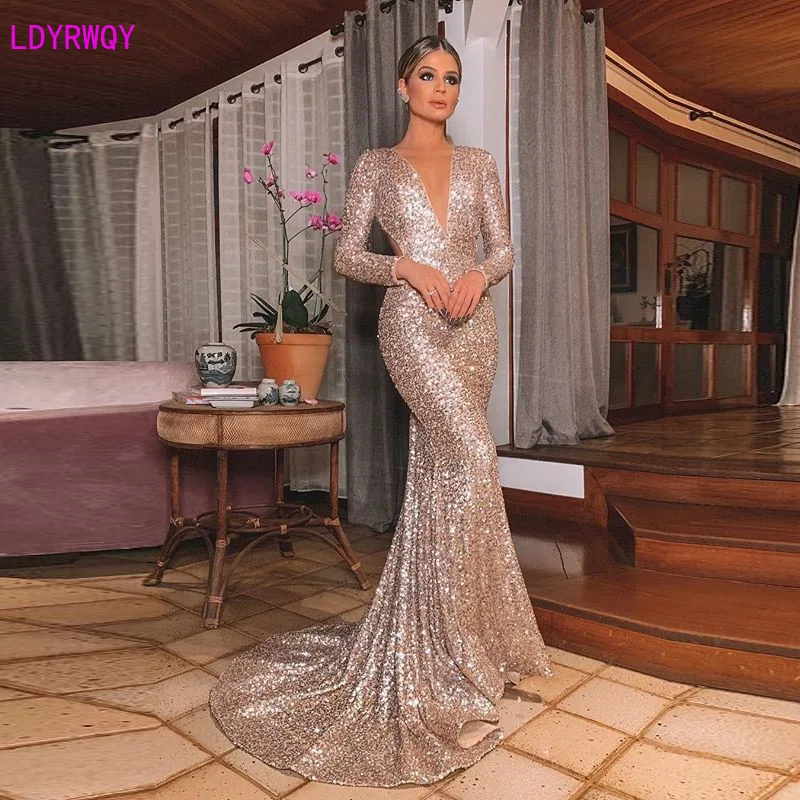 2019 autumn new European and American women's sexy deep V-neck halter sequins nine-point sleeve long bag hip fishtail dress
2019 autumn new European and American women's sexy deep V-neck halter sequins nine-point sleeve long bag hip fishtail dress