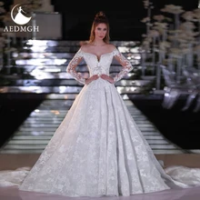 Aedmgh Ball Gown Princess Wedding Dresses 2022 Off The Shoulder Long Sleeve Robe De Marige Lace Applique Pearls Bride Gown 
Aedmgh Ball Gown Princess Wedding Dresses 2022 Off The Shoulder Long Sleeve Robe De Marige Lace Applique Pearls Bride Gown