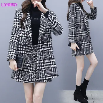 2019 autumn and winter new Korean women's fashion houndstooth lapel long-sleeved button woolen coat skirt two-piece suit
2019 autumn and winter new Korean women's fashion houndstooth lapel long-sleeved button woolen coat skirt two-piece suit