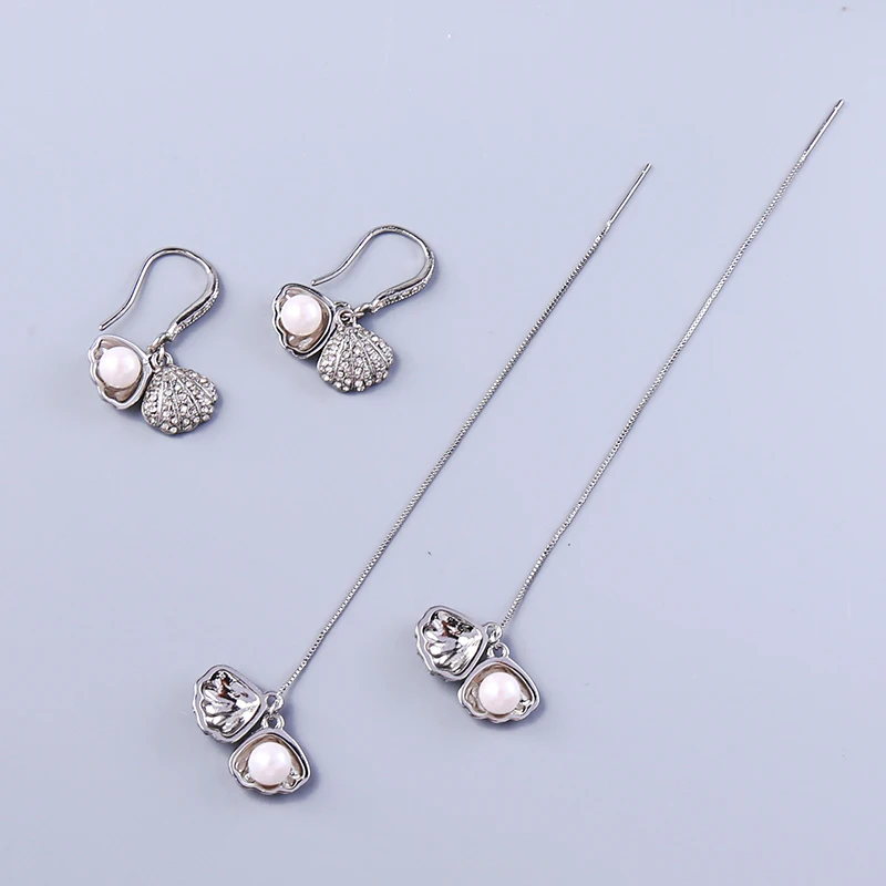 kissme White Gold Color Crystal Imitation Shell Acrylic Pearl Threader Earrings For Women Two-type Fashion Jewelry Dropshipping
kissme White Gold Color Crystal Imitation Shell Acrylic Pearl Threader Earrings For Women Two-type Fashion Jewelry Dropshipping