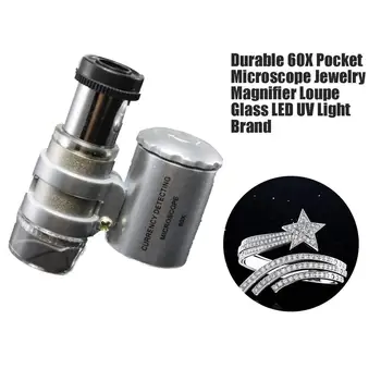 Durable Fashion Creative Mini 60x Handheld Microscope Pocket Loupe Currency Detecting LED UV Light Jewelry Magnifier Brand New
Durable Fashion Creative Mini 60x Handheld Microscope Pocket Loupe Currency Detecting LED UV Light Jewelry Magnifier Brand New