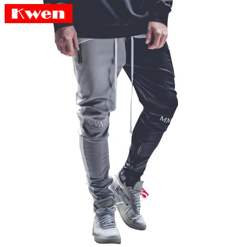 2019 July Stitching color Men Bodybuilding Gyms Pants Runners Clothing Sweatpants Pant Side Stripe Hip Pop Style Streetwear
2019 July Stitching color Men Bodybuilding Gyms Pants Runners Clothing Sweatpants Pant Side Stripe Hip Pop Style Streetwear