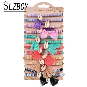 12pcs/lot Bohemian Shell Tassel Pendant Charms Bracelet Set Soft Clay Strand Beads Bracelets for Women Elastic Cuff Wristband 
12pcs/lot Bohemian Shell Tassel Pendant Charms Bracelet Set Soft Clay Strand Beads Bracelets for Women Elastic Cuff Wristband