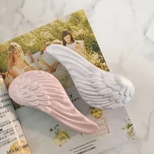 1pc Sangel Wing Detangling Hair Brush Handle Magic Anti-static Shower Massage Hair Comb Tangle Smooth Salon Hairdressing Tool
1pc Sangel Wing Detangling Hair Brush Handle Magic Anti-static Shower Massage Hair Comb Tangle Smooth Salon Hairdressing Tool