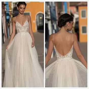 Sexy Boho Wedding Dresses 2020 A-line Lace Applique Beach Bridal Dress Backless Spaghetti Strap V Neck Illusion Wedding Gown New
Sexy Boho Wedding Dresses 2020 A-line Lace Applique Beach Bridal Dress Backless Spaghetti Strap V Neck Illusion Wedding Gown New