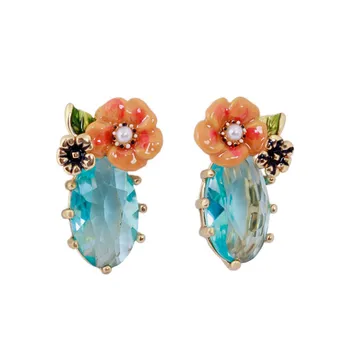 Magical Plant Series Pastoral Style Orange Flower Pearl Gem Earrings Hand-painted Enamel Glaze Gilt Earrings
Magical Plant Series Pastoral Style Orange Flower Pearl Gem Earrings Hand-painted Enamel Glaze Gilt Earrings