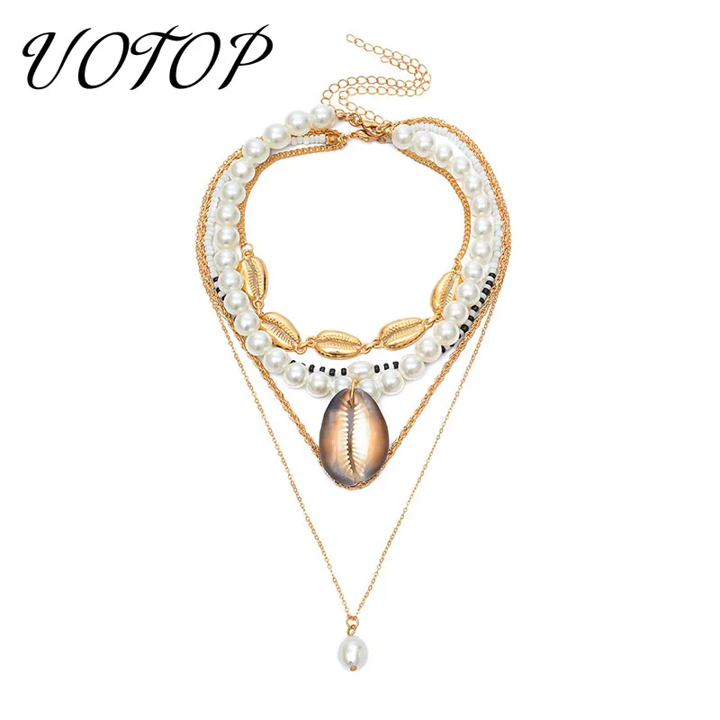 UOTOP 2019 Imitation Beaded Pearl Choker Necklace Neckless Women Multilayer Sea Conch Shell Necklaces Boho Jewelry Cadenas Mujer
UOTOP 2019 Imitation Beaded Pearl Choker Necklace Neckless Women Multilayer Sea Conch Shell Necklaces Boho Jewelry Cadenas Mujer