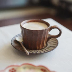 Hand made coarse pottery stripe retro Japanese ceramic mug coffee cup plate suit with spoon set crude pottery tea cup saucers 
Hand made coarse pottery stripe retro Japanese ceramic mug coffee cup plate suit with spoon set crude pottery tea cup saucers