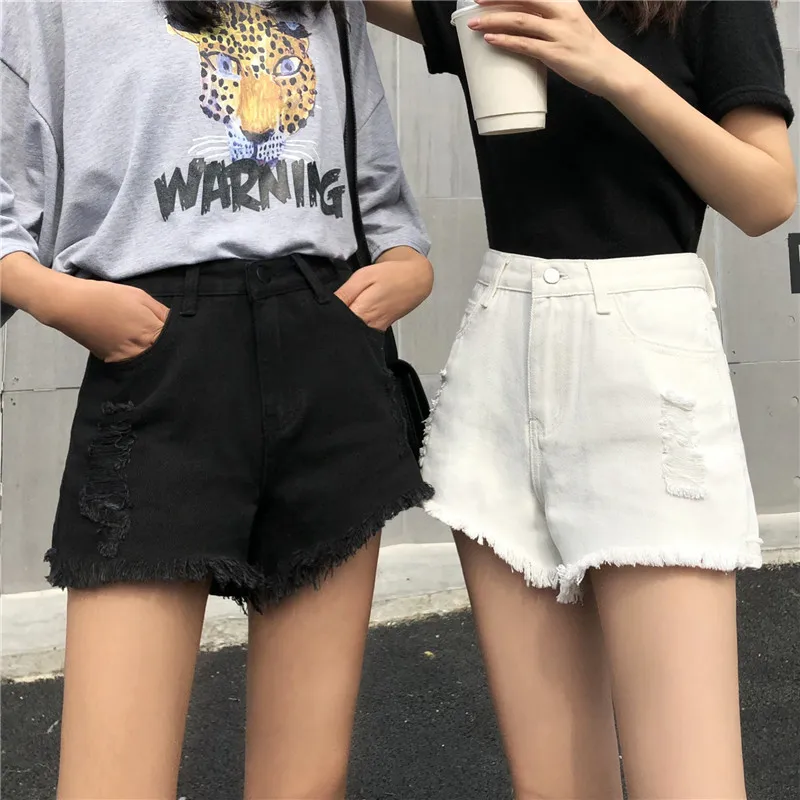 Korean version of the high-waist denim shorts, solid color wild slim pants, loose models with irregular raw edges, and long legs
Korean version of the high-waist denim shorts, solid color wild slim pants, loose models with irregular raw edges, and long legs