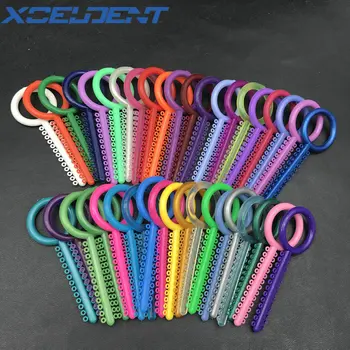 40pcs/Bag Dental Elastomeric Ligature Ties Orthodontic Elastic Rubber Band Teeth Ring Oral Care Orthodontic Bracket 
40pcs/Bag Dental Elastomeric Ligature Ties Orthodontic Elastic Rubber Band Teeth Ring Oral Care Orthodontic Bracket