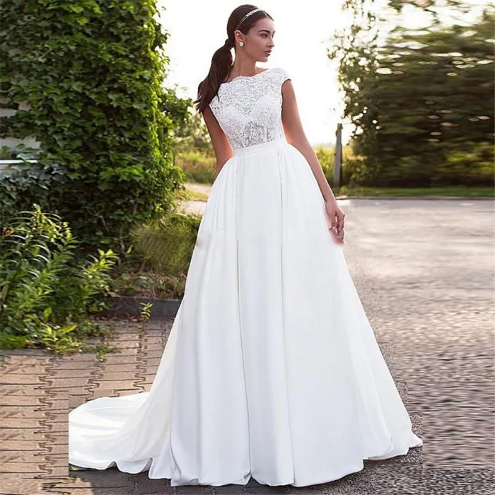 New Bateau Appliques Lace A-Line Wedding Dresses Satin Backless Bridal Gowns 2020 Modest Long Garden Robe De Mariee
New Bateau Appliques Lace A-Line Wedding Dresses Satin Backless Bridal Gowns 2020 Modest Long Garden Robe De Mariee