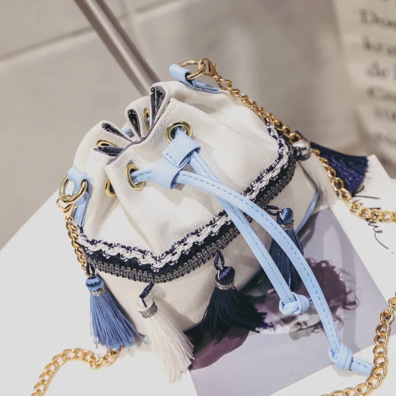 2020 new ethnic style tassel bucket bag fashion mini wild chain bag drawstring shoulder messenger small bag female bag
2020 new ethnic style tassel bucket bag fashion mini wild chain bag drawstring shoulder messenger small bag female bag
