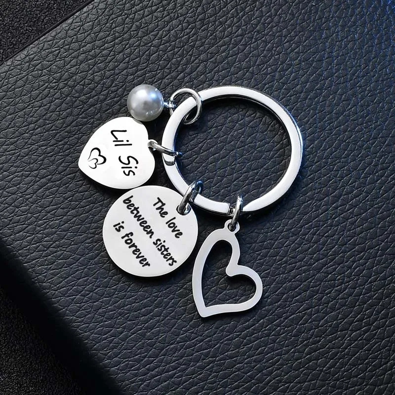 

12PCs The Love Between Sisters Is Forever Keychains Lil Sis Keyrings Love Heart Pearl Pendant Key Rings Xmas Gifts Jewelry Hot