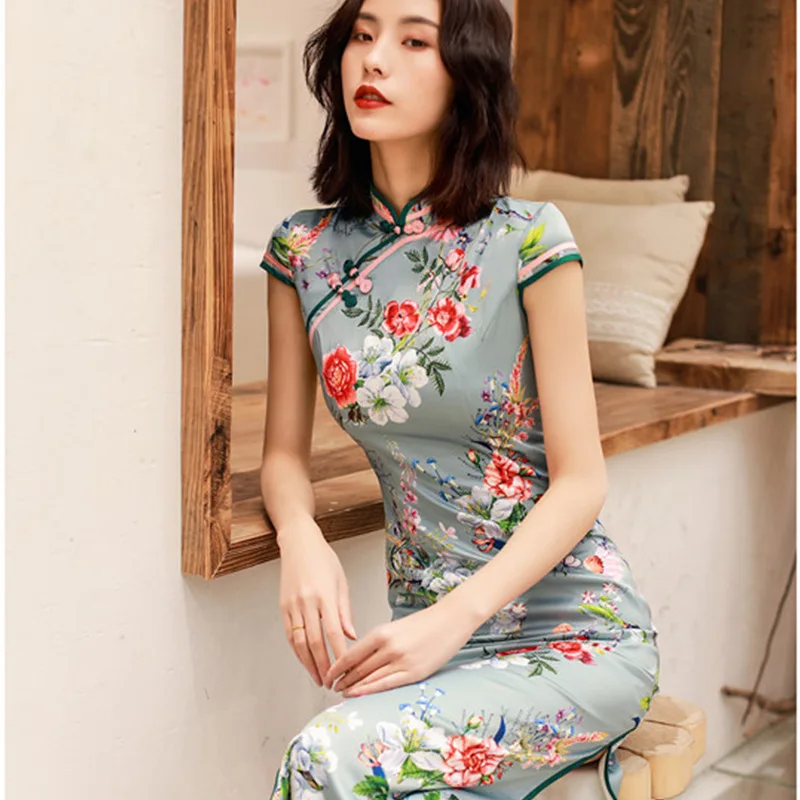 Summer 2019 Elegent Women Artificial Silk Printing Sleeveless Stand Collar Dresses Female Split New Dress Daily Cheongsam 
Summer 2019 Elegent Women Artificial Silk Printing Sleeveless Stand Collar Dresses Female Split New Dress Daily Cheongsam