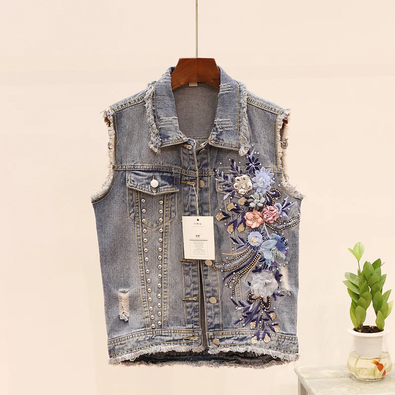 Spring Autumn Embroidery Flower Jeans Vest Women Waistcoat Beading Korean Fashion Loose Women Denim Vest Sleeveless Jacket Coat
Spring Autumn Embroidery Flower Jeans Vest Women Waistcoat Beading Korean Fashion Loose Women Denim Vest Sleeveless Jacket Coat