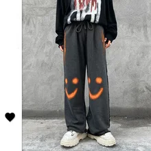 Streetwear Men Hip Hop Smiling Face Graffiti Printed Casual Trousers Male Fashion Sports Joggers Loose Wide Leg Pants Sweatpants
Streetwear Men Hip Hop Smiling Face Graffiti Printed Casual Trousers Male Fashion Sports Joggers Loose Wide Leg Pants Sweatpants