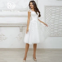 2022 Ramanda Boho Tulle Short Wedding Dress Princess Cap Sleeves A-Line Lace Appliques Illusion Back With Button Bridal Gown
2022 Ramanda Boho Tulle Short Wedding Dress Princess Cap Sleeves A-Line Lace Appliques Illusion Back With Button Bridal Gown