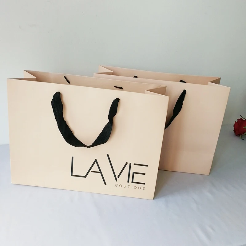 1000Pcs/Lot Custom Logo Printed Luxury Thickened Simple Portable Paper Shopping Bag Design Clothing Packaging Bags for Boutique
1000Pcs/Lot Custom Logo Printed Luxury Thickened Simple Portable Paper Shopping Bag Design Clothing Packaging Bags for Boutique