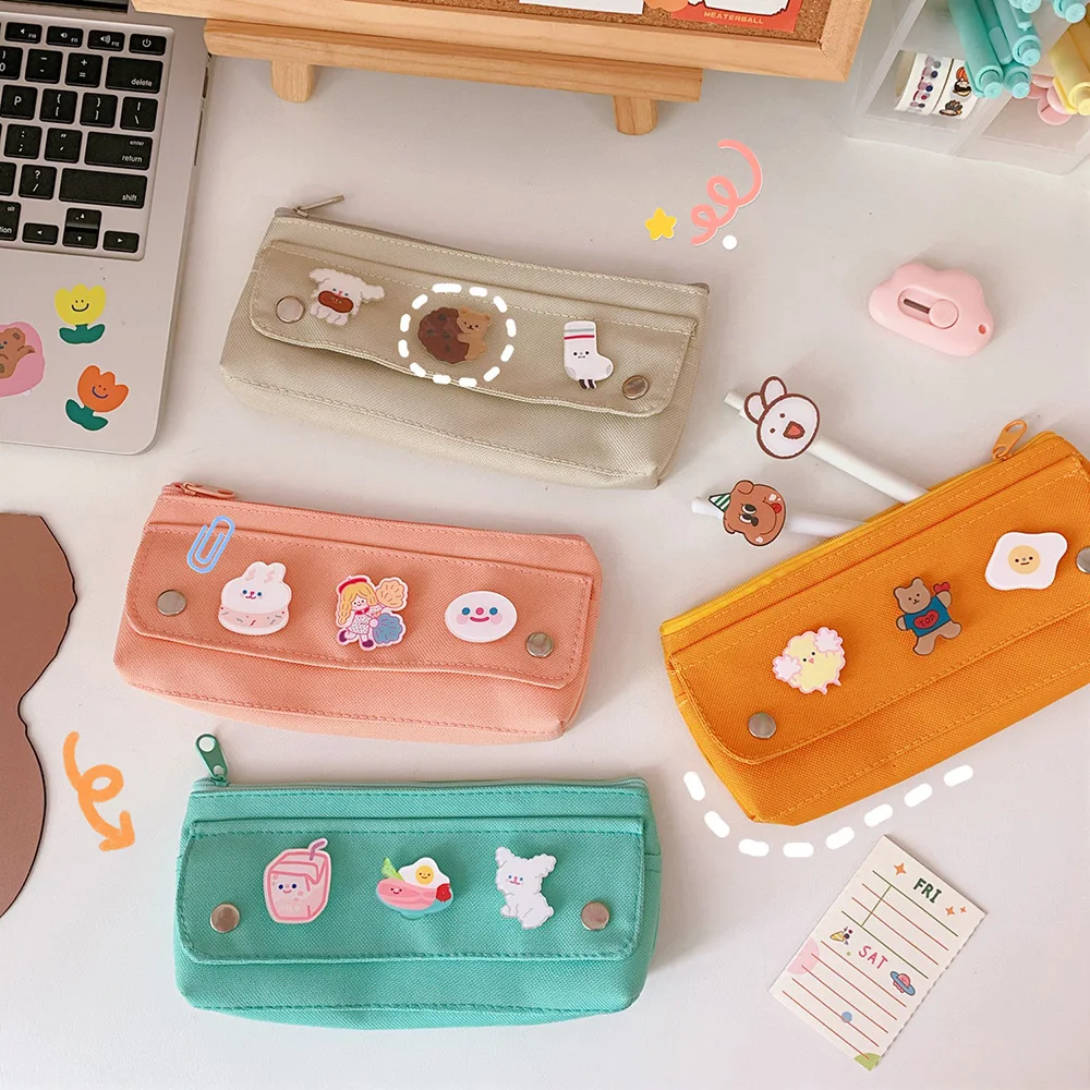 Ins Cartoon Cute Canvas Badge Pencil Bag Solid Color Large Capacity Multifunctional Storage Bag Student Pencil Case Stationery
Ins Cartoon Cute Canvas Badge Pencil Bag Solid Color Large Capacity Multifunctional Storage Bag Student Pencil Case Stationery