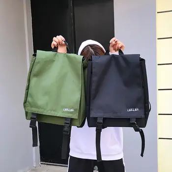 Oxford cloth waterproof clamshell tooling backpack female and male couple schoolbag casual solid color backpack travel bag tide 
Oxford cloth waterproof clamshell tooling backpack female and male couple schoolbag casual solid color backpack travel bag tide