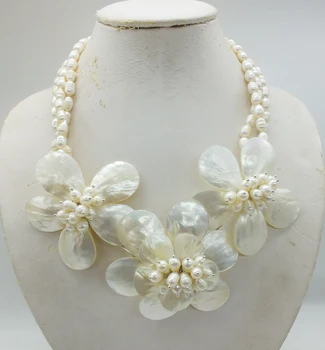 Craftsman carefully designed! Beautiful white pearls, shell flower necklace. 20" 
Craftsman carefully designed! Beautiful white pearls, shell flower necklace. 20"