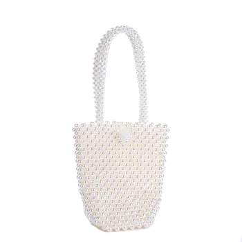 Summer Bucket design women Pearl Bag clutch hollow style beaded bag pearl Fashion Banquet Party handbag Female 2020 Wedding Bags
Summer Bucket design women Pearl Bag clutch hollow style beaded bag pearl Fashion Banquet Party handbag Female 2020 Wedding Bags